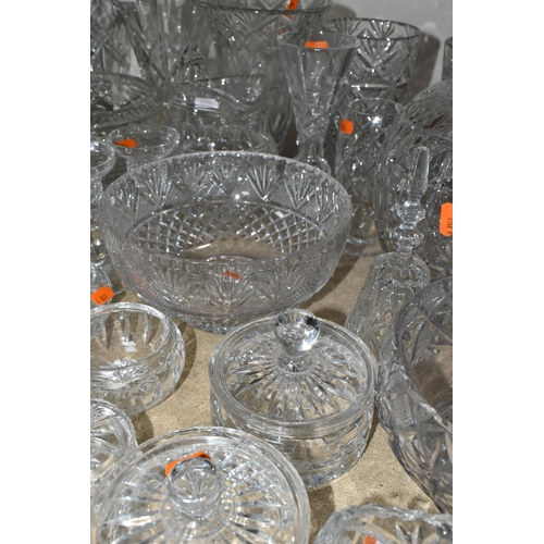 395 - A QUANTITY OF CUT CRYSTAL BOWLS AND VASES, comprising Stuart Crystal trinket boxes, five fruit bowls... 