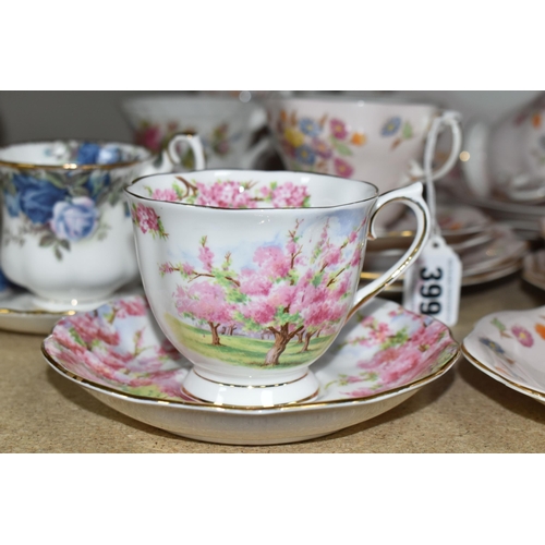 399 - A FOLEY BONE CHINA TEA SET PATTERN 2869, multicoloured meadow flowers on a pink ground, comprising a... 