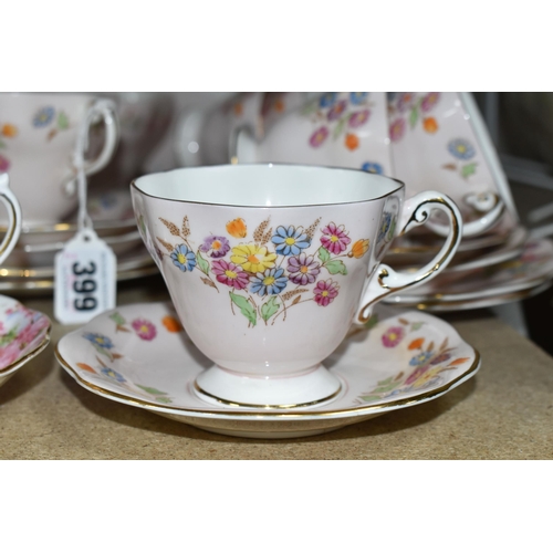 399 - A FOLEY BONE CHINA TEA SET PATTERN 2869, multicoloured meadow flowers on a pink ground, comprising a... 