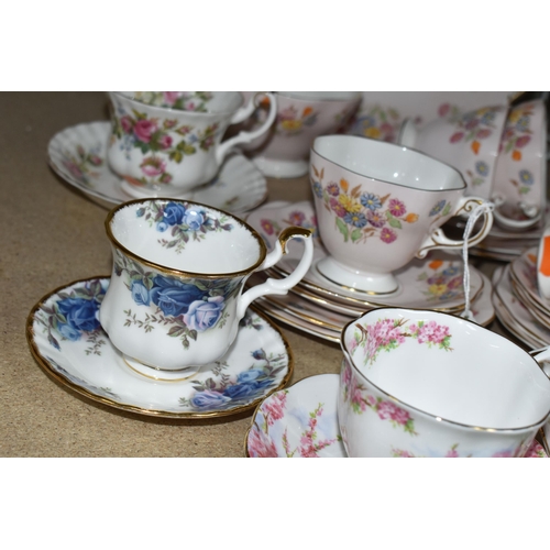 399 - A FOLEY BONE CHINA TEA SET PATTERN 2869, multicoloured meadow flowers on a pink ground, comprising a... 