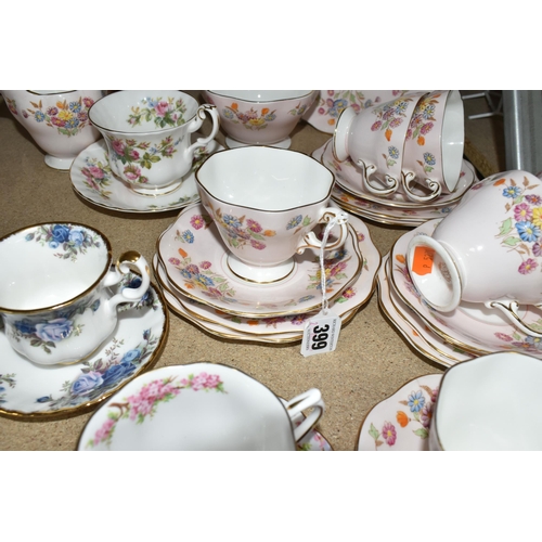 399 - A FOLEY BONE CHINA TEA SET PATTERN 2869, multicoloured meadow flowers on a pink ground, comprising a... 