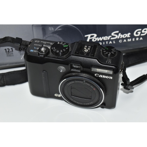 435 - A BOXED CANON POWERSHOT G9 DIGITAL CAMERA, box contains instructions in Italian and German, software... 