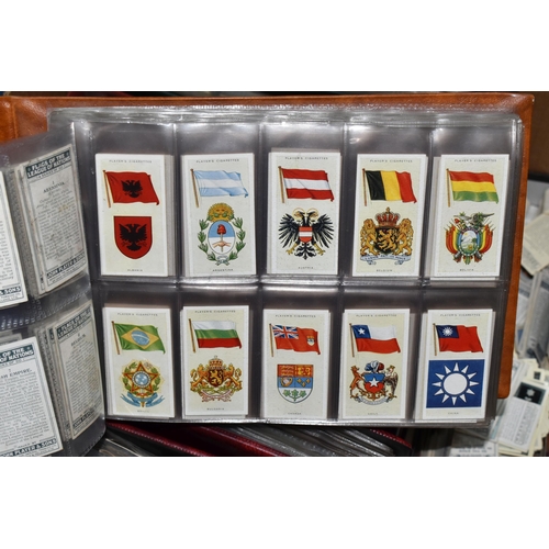 440 - CIGARETTE CARDS, a large collection of Cigarette Cards in eight albums, sleeves and loose containing... 