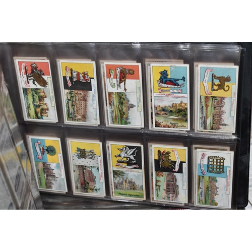 440 - CIGARETTE CARDS, a large collection of Cigarette Cards in eight albums, sleeves and loose containing... 