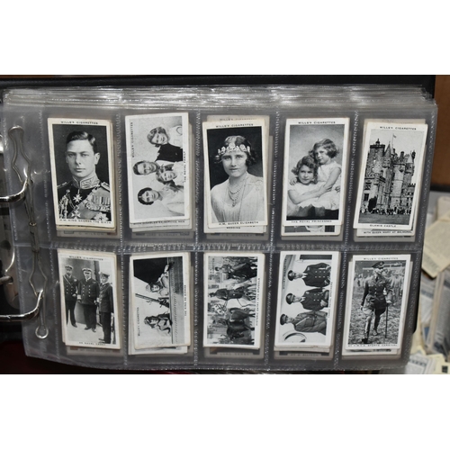 440 - CIGARETTE CARDS, a large collection of Cigarette Cards in eight albums, sleeves and loose containing... 