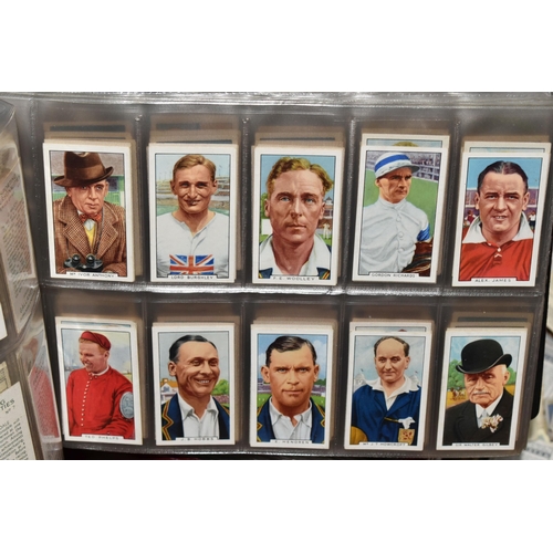 440 - CIGARETTE CARDS, a large collection of Cigarette Cards in eight albums, sleeves and loose containing... 