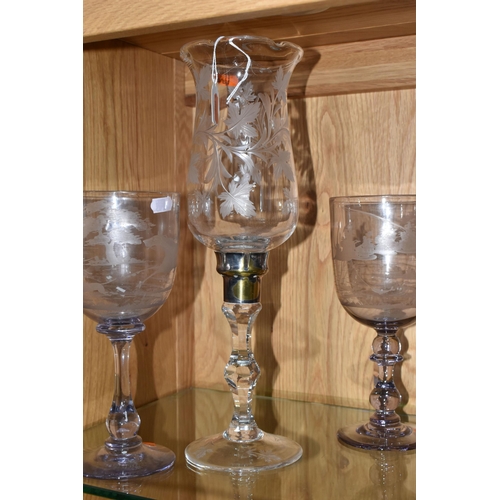 446 - THREE PIECES OF ENGRAVED GLASS WARE, comprising a clear glass candle lantern with foliate decoration... 