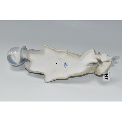 447 - A LLADRO CLOWN, no 4618, designed by Salvador Furio in 1970, the figure lying on his front with head... 