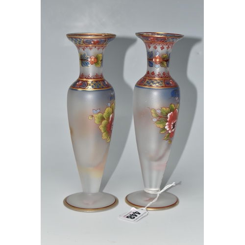 448 - TWO ATLANTIS GLASS FOOTED VASES, painted with flowers and foliate or geometric borders, having gilt ... 