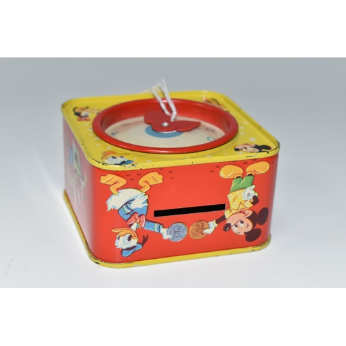 455 - A CHAD VALLEY WALT DISNEY PRODUCTIONS MONEY BOX, the tin with toy clock with movable hands on one si... 