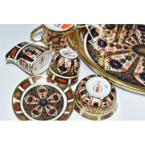 456 - A MINIATURE ROYAL CROWN DERBY IMARI 1128 TEA SET AND SERVING TRAY, comprising an oval serving tray, ... 