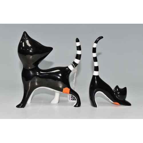 459 - TWO CMIELOW FIGURES OF BLACK AND WHITE CATS, the largest a standing cat with head tilted, model no 2... 