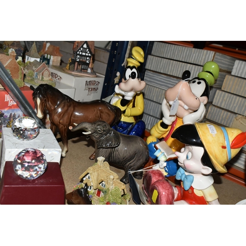 505 - A GROUP OF PAPERWEIGHTS AND ORNAMENTS, comprising three Schmid Disney Music Boxes, a Beswick Mare (F... 