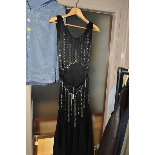 520 - A 1920'S/30'S BLACK SATIN AND CHIFFON COCKTAIL DRESS, together with a pair of long powder blue kid l... 