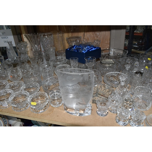 544 - A LARGE QUANTITY OF CUT CRYSTAL AND GLASSWARE, comprising a David Whyman glass vase depicting a nigh... 