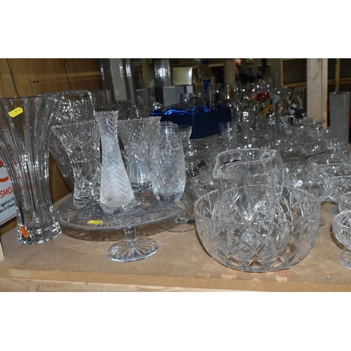 544 - A LARGE QUANTITY OF CUT CRYSTAL AND GLASSWARE, comprising a David Whyman glass vase depicting a nigh... 