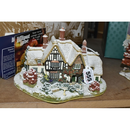 555 - TWO BOXED LILLIPUT LANE SNOW COTTAGES, comprising a limited edition ' First Snow At Bluebell'  2485/... 