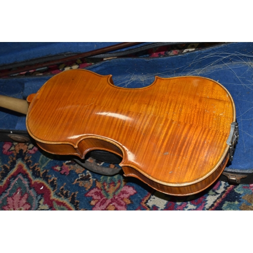 558 - AN UNBRANDED 20TH CENTURY VIOLIN IN HARD CASE, the two piece back is approximately 35cm long with a ... 