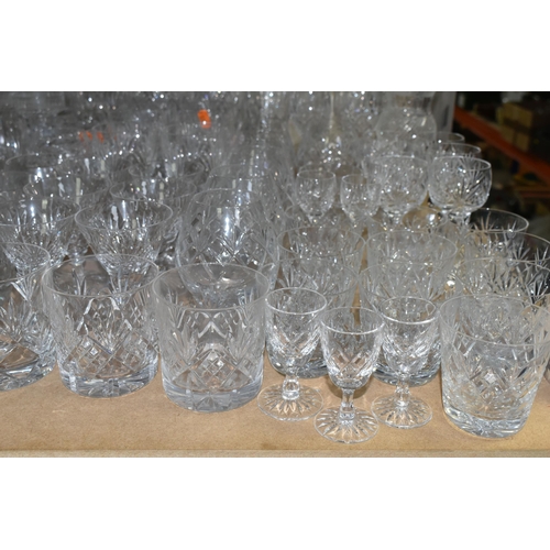 563 - A QUANTITY OF CUT GLASS DRINKING GLASSES ETC, to include sets of large and small wine glasses, brand... 