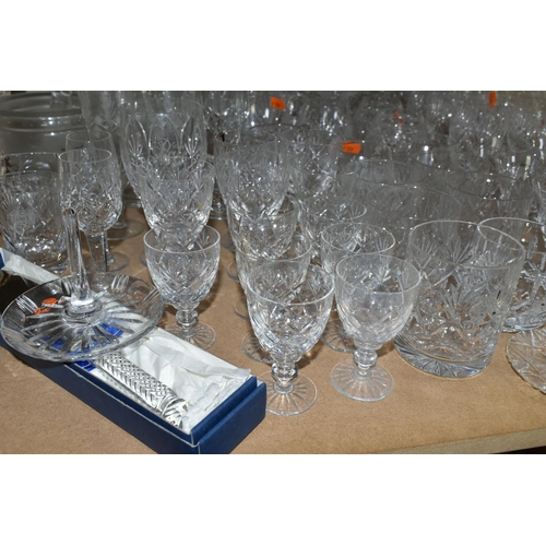 563 - A QUANTITY OF CUT GLASS DRINKING GLASSES ETC, to include sets of large and small wine glasses, brand... 