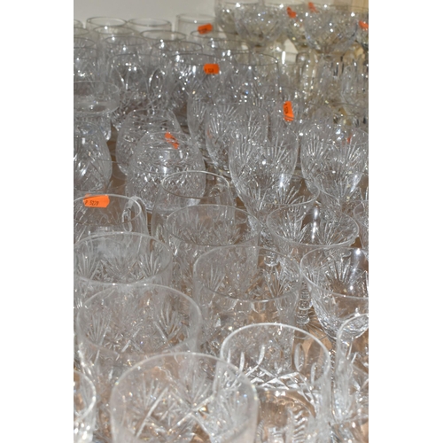 563 - A QUANTITY OF CUT GLASS DRINKING GLASSES ETC, to include sets of large and small wine glasses, brand... 