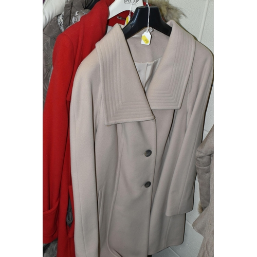 591 - A GROUP TWENTY TWO LADIES' JACKETS, GILETS AND COATS, comprising three modern 'sheepskin' coats, a s... 