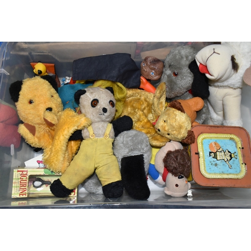 604 - A QUANTITY OF FILM AND TV RELATED TOYS AND SOFT TOYS, to include Sooty & Sweep, Rupert the Bear, E.T... 