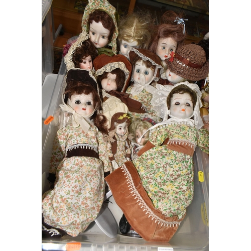 613 - TWO BOXES OF BISQUE HEAD COLLECTOR'S DOLLS, to include approximately eighteen dolls in various style... 