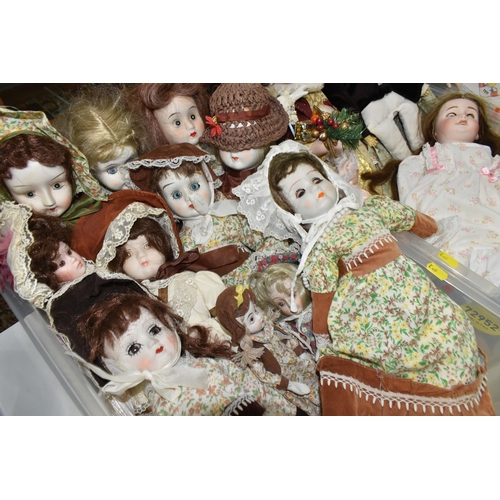 613 - TWO BOXES OF BISQUE HEAD COLLECTOR'S DOLLS, to include approximately eighteen dolls in various style... 