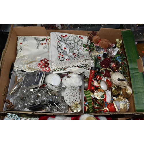 623 - NINE BOXES OF CHRISTMAS DECORATIONS, to include a large quantity of baubles, ribbons, packs of paper... 