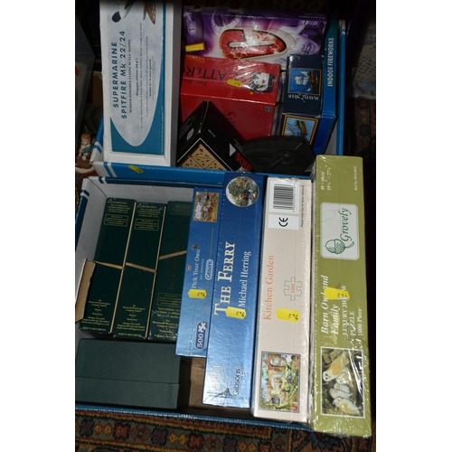 624 - THREE BOXES OF JIGSAWS AND BOARD GAMES, to include two sealed Gibsons jigsaws, sealed HOP jigsaw and... 