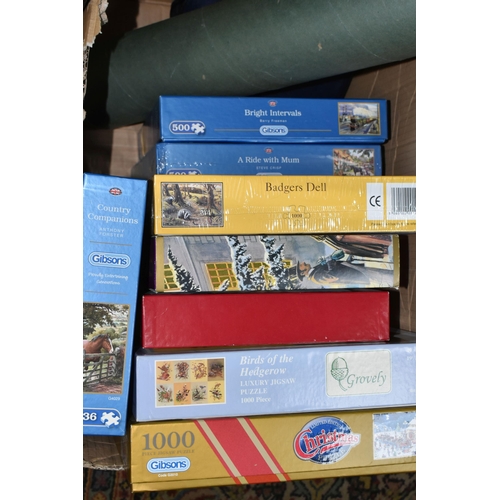 624 - THREE BOXES OF JIGSAWS AND BOARD GAMES, to include two sealed Gibsons jigsaws, sealed HOP jigsaw and... 