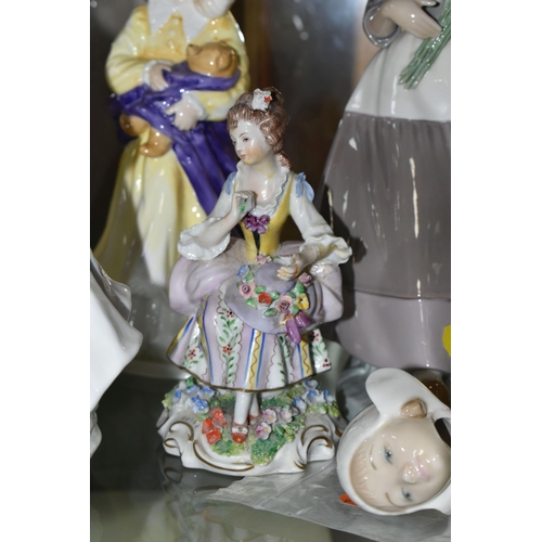 628 - EIGHT FIGURINES OF GIRLS, LADIES AND FATHER CHRISTMAS, ETC, comprising a set of three Royal Doulton ... 