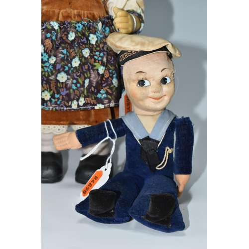 635 - A NORAH WELLINGS SAILOR DOLL, ANOTHER SIMILAR AND TWO LATE 20TH CENTURY HUMMEL STYLE DOLLS, the Nora... 