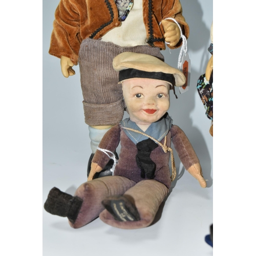 635 - A NORAH WELLINGS SAILOR DOLL, ANOTHER SIMILAR AND TWO LATE 20TH CENTURY HUMMEL STYLE DOLLS, the Nora... 