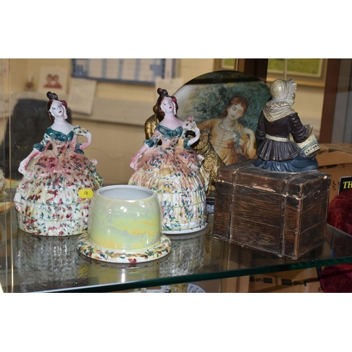 639 - TWO 19TH CENTURY STAFFORDSHIRE LADIES BOUDOIR POTS, crinoline ladies with pots underneath the skirt ... 