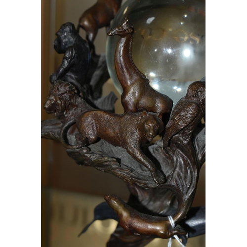 643 - A BRONZE FRANKLIN MINT SCULPTURE 'GUARDIANS OF THE WORLD' CRYSTAL BALL, by Steven Lord, a central cr... 