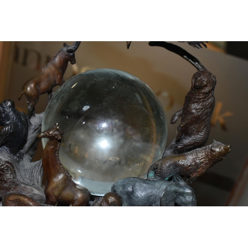 643 - A BRONZE FRANKLIN MINT SCULPTURE 'GUARDIANS OF THE WORLD' CRYSTAL BALL, by Steven Lord, a central cr... 