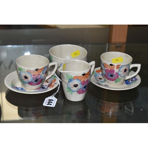 644 - A SIX PIECE CLARICE CLIFF 'ANEMONE' PART TEA SET, comprising two teacups and saucers, a cream jug an... 