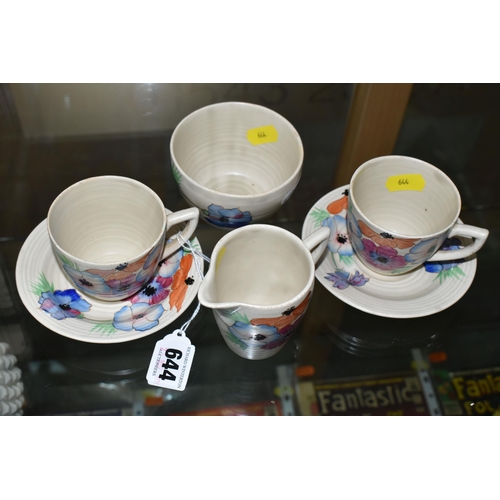 644 - A SIX PIECE CLARICE CLIFF 'ANEMONE' PART TEA SET, comprising two teacups and saucers, a cream jug an... 