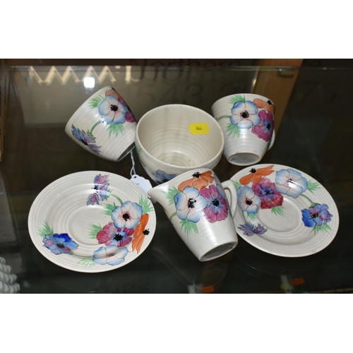 644 - A SIX PIECE CLARICE CLIFF 'ANEMONE' PART TEA SET, comprising two teacups and saucers, a cream jug an... 