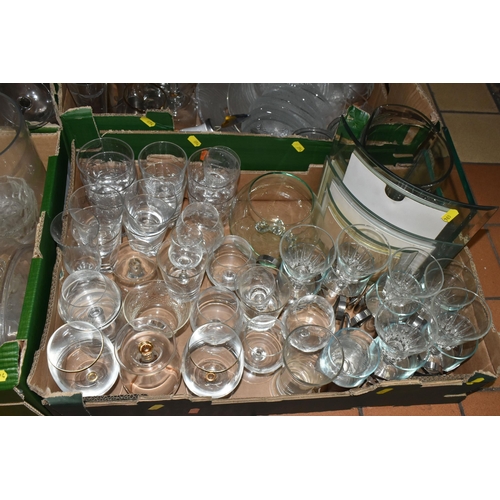 694 - FOUR BOXES OF GLASSWARE, to include drinking glasses, vases, photo frames, a light bulb shaped Galil... 