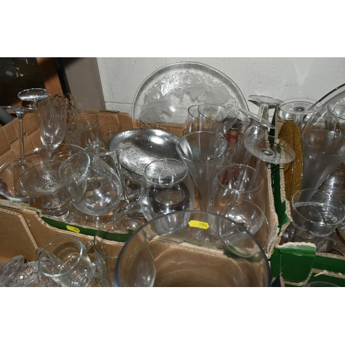 694 - FOUR BOXES OF GLASSWARE, to include drinking glasses, vases, photo frames, a light bulb shaped Galil... 