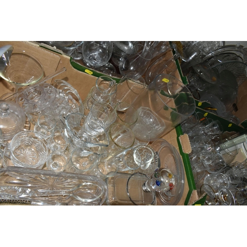 694 - FOUR BOXES OF GLASSWARE, to include drinking glasses, vases, photo frames, a light bulb shaped Galil... 