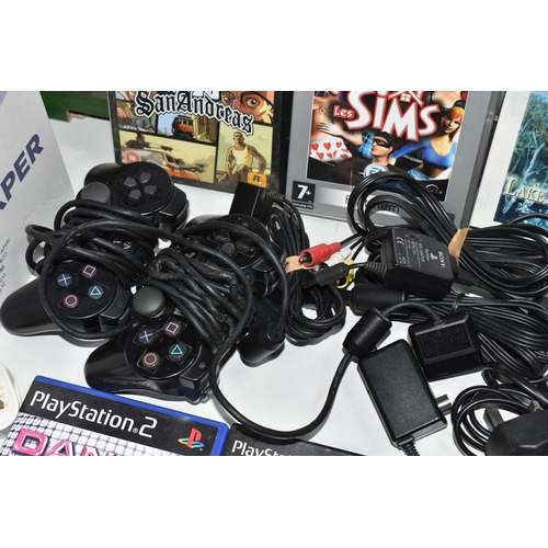 695 - SONY PLAYSTATION 2 CONSOLE AND GAMES, has over twenty games including Rayman 10th Anniversary, Sonic... 