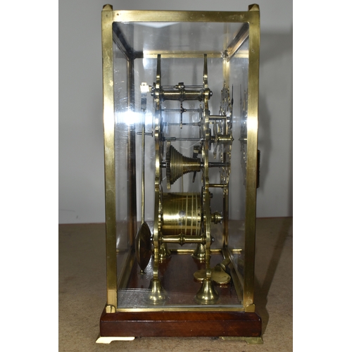 342 - A GLASS CASED VICTORIAN BRASS FUSEE SKELETON CLOCK, the arch shaped clock with silvered chapter ring... 