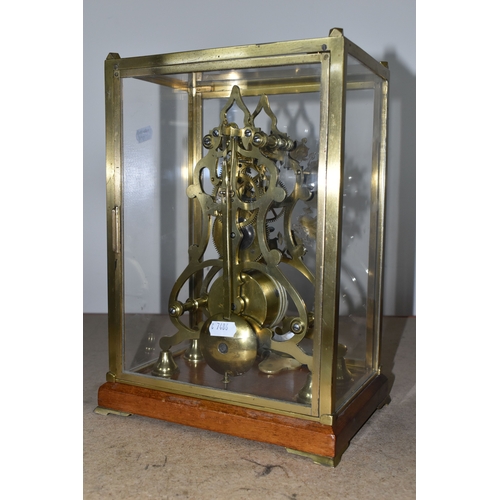 342 - A GLASS CASED VICTORIAN BRASS FUSEE SKELETON CLOCK, the arch shaped clock with silvered chapter ring... 