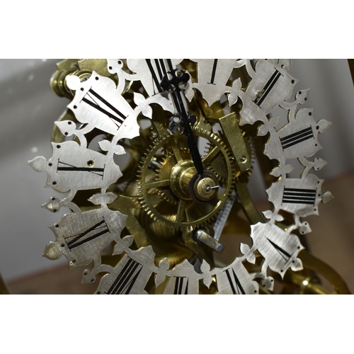 342 - A GLASS CASED VICTORIAN BRASS FUSEE SKELETON CLOCK, the arch shaped clock with silvered chapter ring... 