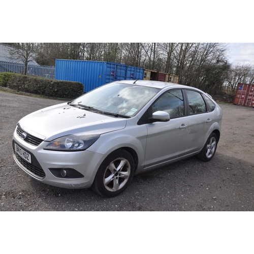 1002 - A 2010 FORD FOCUS ZETEC 100 5 door HATCHBACK in silver, first registered 23/07/2010 under number BN1... 