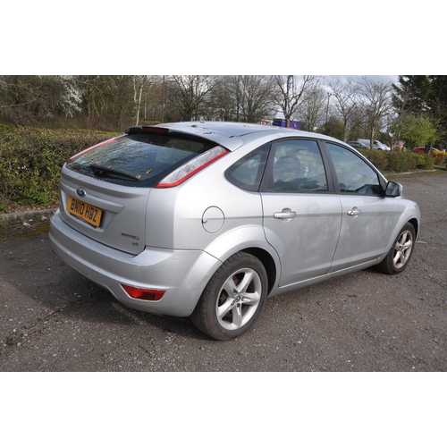 1002 - A 2010 FORD FOCUS ZETEC 100 5 door HATCHBACK in silver, first registered 23/07/2010 under number BN1... 